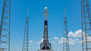 SpaceX Falcon 9 rocket on a launch pad.