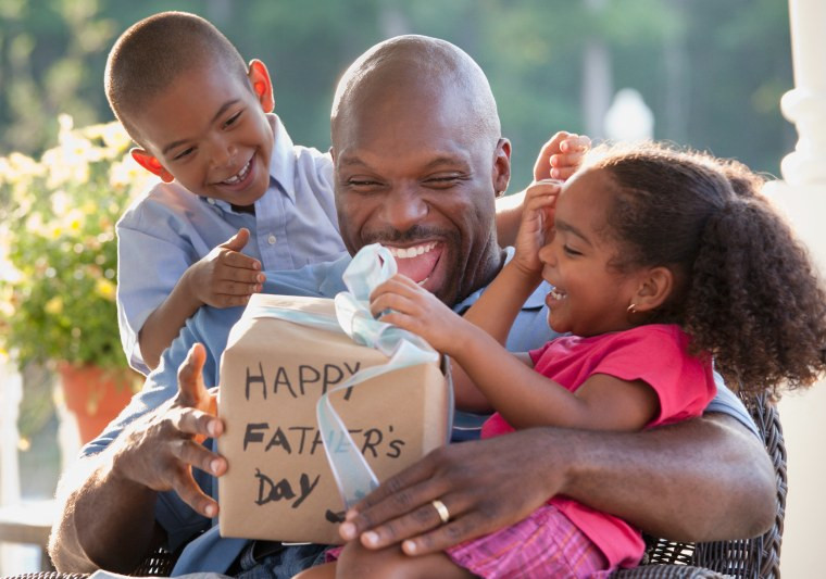 Father and child playing catch for Father's Day